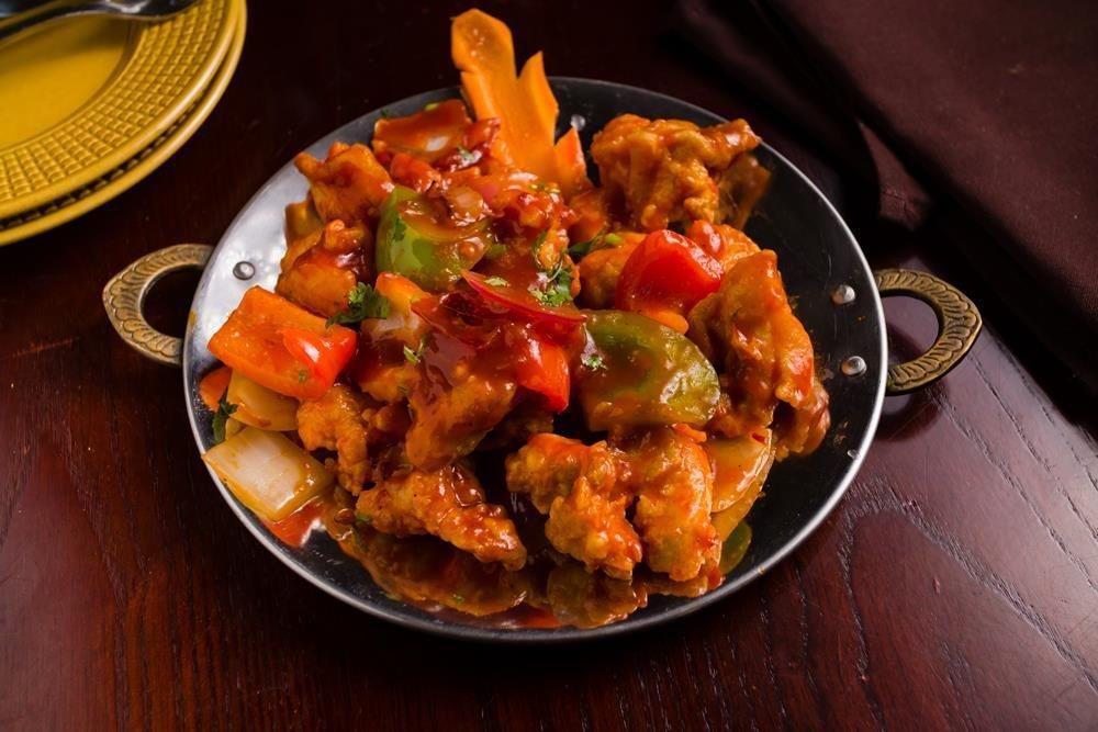 Chili Chicken (Dry) · Paneer sautéed with green chilies, soy-ginger flavor.