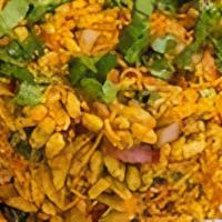 Mumbai Bhel Puri · Puffed rice, savory morsels, chutnies.