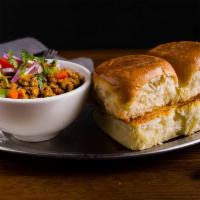 Murgh Khurchan Pav · Tandoor cooked spiced chicken morsels, bell peppers served with pav buns.