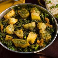 Aloo Methi · Potatoes with fenugreek leaves blended with Indian spices and herbs.