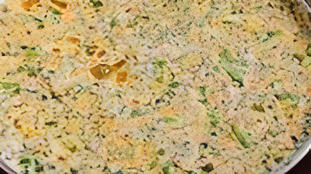 Methi Paneer Mutter · Creamy green peas, paneer cheese, fenugreek leaves.