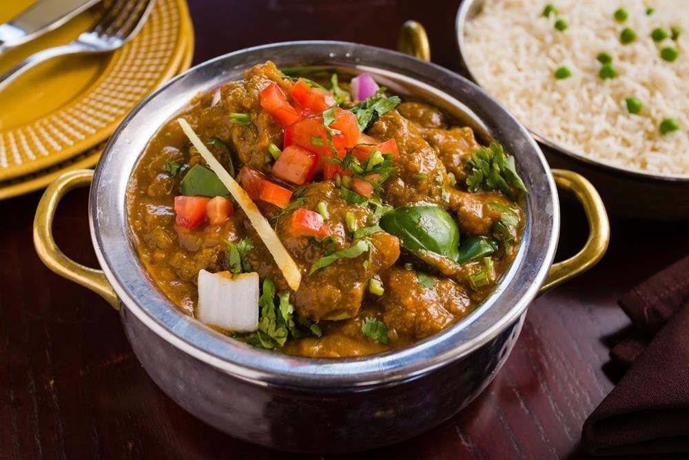 Kadai Goat · Goat tossed with onions, bell peppers, fenugreek, fresh coriander.