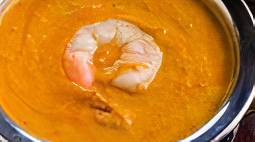 Jhinga Tikka Masala · Tandoori shrimp, creamy tomato sauce, and shrimp.
