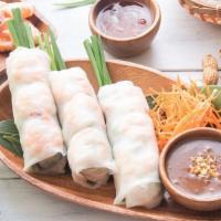 Grilled Shrimp Roll (2) · Hand rolled rice paper filled fresh shrimp, vermicelli, lettuce, mint, cucumber and fried sh...