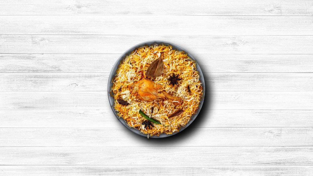 Peshawari Chicken Biryani · Succulent chunks of chicken cooked with our signature biryani masala gravy and long grain premium basmati rice