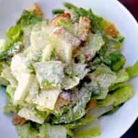Caesar Salad · Romaine lettuce, croutons, parmesan mozzarella cheese.