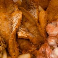 Ultimate Seafood Platter · 2 pc. whiting fish, 2 fried shrimp, 2 pc. scallop, 3 pc spiced shrimp, 1 small crab cake.