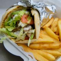 Lamb Gyro Platter · With fries and can soda.
