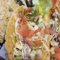 Mediterranean Tacos · Blackened tilapia topped with cabbage, roasted poblano peppers, tomatoes, green olive and ca...