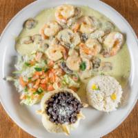 Camarones 1800 · Jumbo shrimp sautéed with mushrooms, pecans, Cotija cheese and olive oil. Served on a bed of...