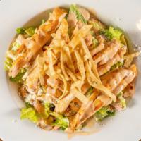 Southwestern Caesar Salad · A new spicy twist on the traditional Caesar Salad, with corn, tomatoes, Cotija cheese and gr...