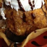 Fried Ice Cream · Made of breaded scoop of ice cream whit cinnamon and sugar, quickly deep fried creating a wa...