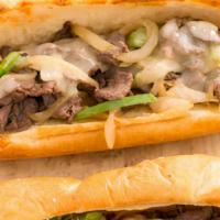 Cheesesteak · Mini. Sliced pieces of beef steak topped with melted cheese.