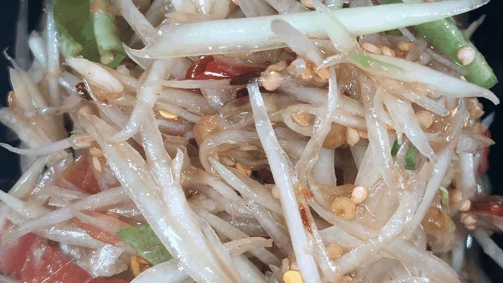 B Som Tum Lao Style With Fermented Fish Sauce * · Spicy. Fresh green papaya salad, green bean, cherry tomato flavored with lime, garlic chili, and fish sauce. Request salted crab for an additional charge.