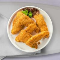 Just The Tender · Chicken tenders breaded and fried until golden brown. Served with your choice of dipping sau...