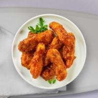 Bbq Bliss Tender · Chicken tenders breaded and fried until golden brown before being tossed in barbecue sauce. ...