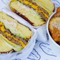 Cheeseburger · Classic thin patties, all-American cheese,. shredded lettuce, sliced pickles. Sriracha Dijon...