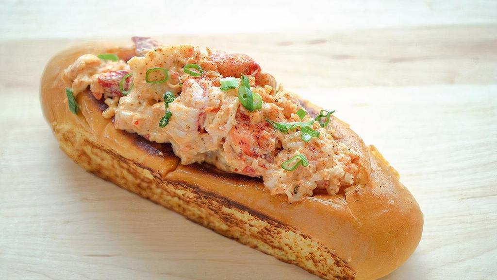 Spicy Lobster Roll · Chilled N.E. Atlantic Lobster Meat tossed In A. Spicy Chipotle Pepper Aioli, Cherry Peppers