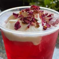 Roses & Cream · Rose infused tea with touch of sour hibiscus flavors, lightly sweetened, topped with cream a...