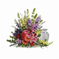 Shades Of Faith · Standard. A rainbow of reverence. This uplifting arrangement of lilies, roses and snapdragon...