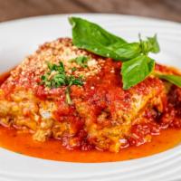 Homemade Lasagna · Noodles layered with ricotta cheese filling and sweet italian sausage with melted mozzarella...
