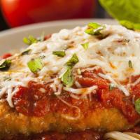 Chicken Parmesan · Boneless breasts of chicken breaded with panko bread crumbs and season, topped with melted m...