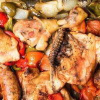 Chicken Scarpariello · Pieces of boneless chicken breast sautéed with white wine, Italian sweet sausage, bell peppe...