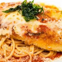 Veal Parmesan · Veal scallopini breaded with panko bread crumbs topped with melted mozzarella cheese in our ...