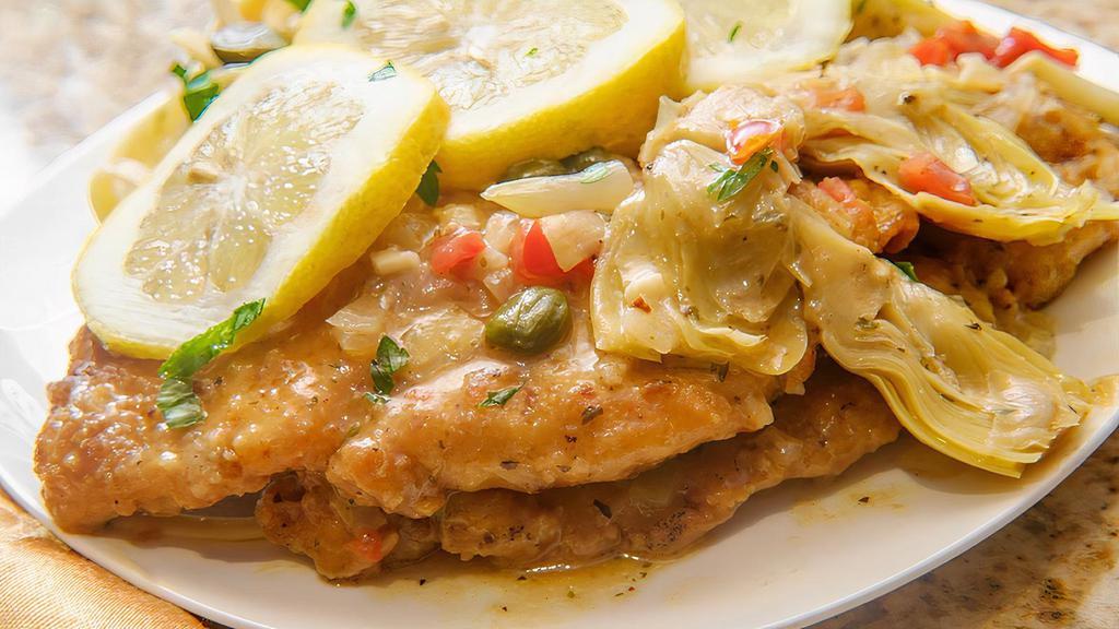 Veal Alla Francese · Veal scallopini sautéed in white wine, butter and lemon sauce.