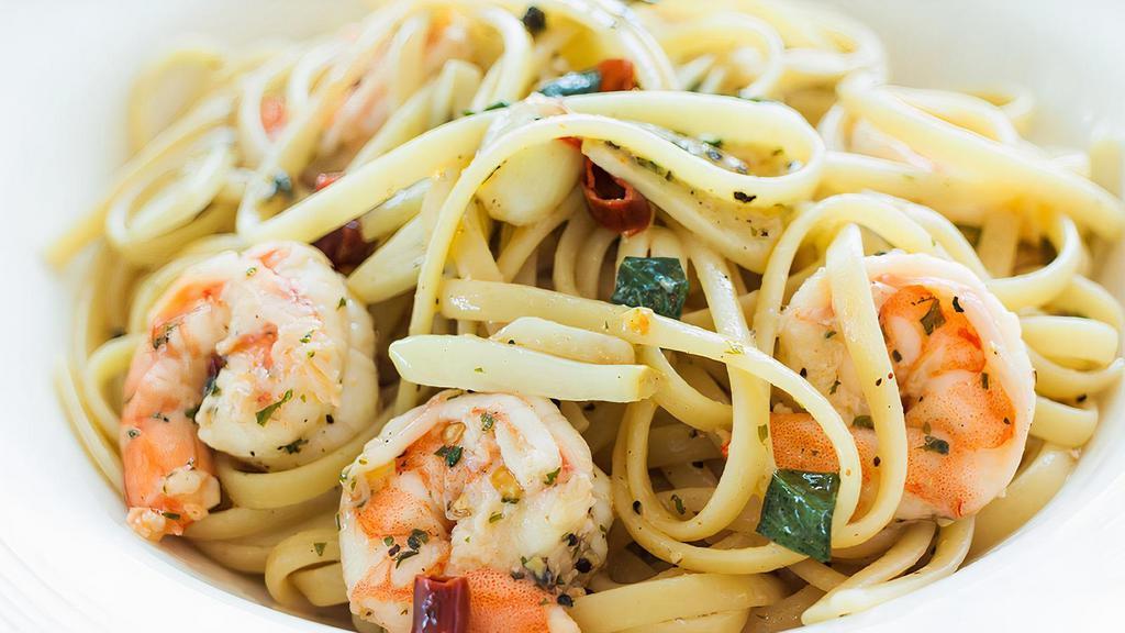 Shrimp Scampi · Jumbo shrimp sautéed in extra virgin olive oil, garlic, lemon and a white wine sauce.