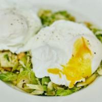 Lindstrom · Shaved Brussels Sprouts, Hazelnuts, Parmesan, Lemon Vinaigrette and Two Poached Eggs.