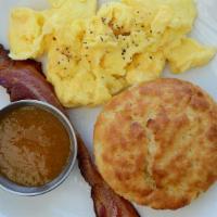 Kid'S Egg Plate · One Scrambled Egg, Bacon or Sausage, Buttermilk Biscuit with Jam.