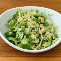 Salad · Shaved Brussels Sprouts, Hazelnuts, Parmesan, Lemon Vinaigrette.