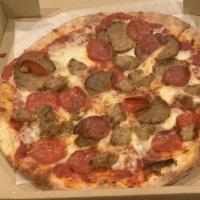 Meat Lovers Pie · Traditional cheese pie topped with pepperoni, sausage and meatballs.