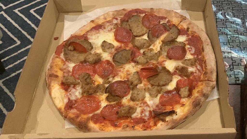Meat Lovers Pie · Traditional cheese pie topped with pepperoni, sausage and meatballs.