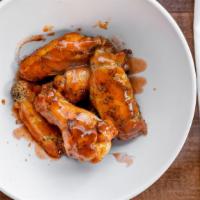 Chicken Wings · Wings marinated in our house herb and spice mixture. Please memo if you would like buffalo, ...