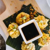Steamed Thai Dumplings (5 Pcs) · Steamed house-made dumpling filled with a mix of pork, shrimp, and water chestnut served wit...