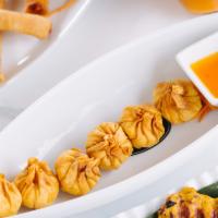 Crab Cream Cheese (5 Pcs) · Crispy imitation crab and cream cheese wonton served with sweet and sour sauce.