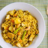 Pineapple Fried Rice · Jasmine rice with your choice of meats, egg, pineapple, cashew nut, onion, pea, curry powder...