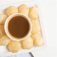 Gol Gappa · Small puffy, wheat balls served with chickpeas, potato and special sweet. tangy water.