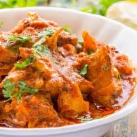 Boneless Chicken Tikka Masala · A grilled chunk of chicken cooked with tomato and onion sauce