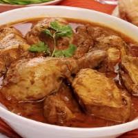 Chicken Korma · Chicken cooked in special curry sauce.