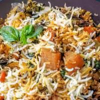 Vegetable Biryani · Basmati rice with mixed vegetables in a blend of herbs and saffron