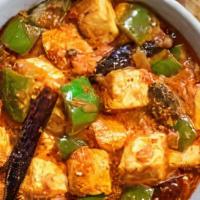 Paneer Karahi · Home made cheese cooked in exotic spices along with tomato, onion, jalapeno and ginger