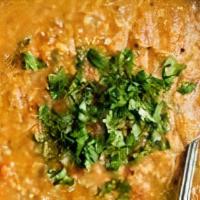 Daal Tadka  · Yellow lentils and beans combined with our home made onion sauce, spices and cooked to get a...