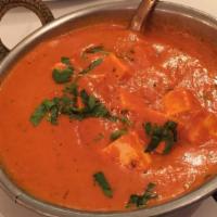 Paneer Makhani · Cottage cheese sautéed in our special tomatoes buttery sauce.