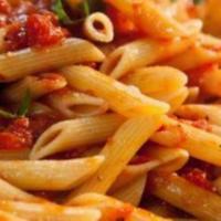 Penne Arrabiata · Penne pasta, fresh basil, spicy marinara, topped with parmesan.