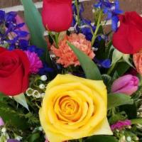 Rainbow Bouquet · Vibrant mix of all the colors in the flower world with a half dozen roses included. Vased Ar...