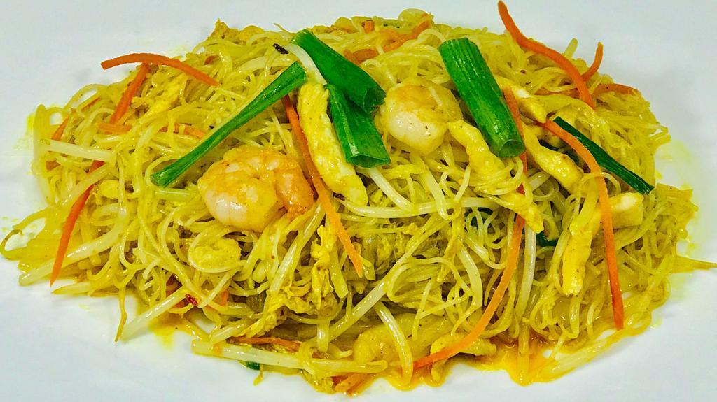 Singapore Noodle · Gluten free. Spicy. Chicken, shrimp and vegetable with curry flavor.