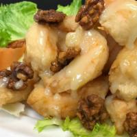 Walnuts Shrimp · Gluten free. Crispy jumbo shrimp and walnuts with sweet sauce over lettuce.